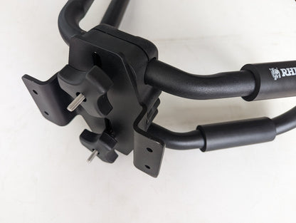 TRUKD Kayak/Gear Mount bracket bolted to a T Series crossbar with a J-hook kayak carrier attached